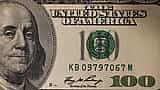 A close-up view of a United States one hundred-dollar bill.