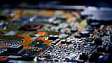 A close-up view of an electronic circuit board with a shallow depth of field.
