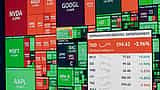 A colorful stock market heatmap display showing the varying performance of major tech companies and other sectors.