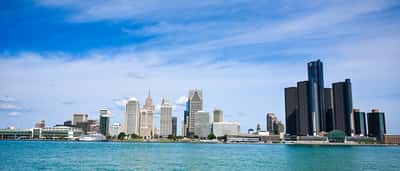 The General Motors Renaissance Center stands prominently in the Detroit skyline.