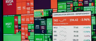 A colorful stock market heatmap display showing the varying performance of major tech companies and other sectors.