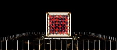 A glowing, futuristic digital processor representing advanced computing technology.