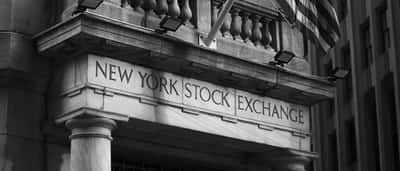 The stone facade and columns of the New York Stock Exchange building.
