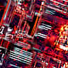 A detailed 3D rendering of glowing red and orange digital circuit blocks representing complex technology networks.
