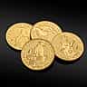 Three one-ounce fine gold coins resting on a dark reflective surface.