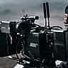 A close-up of a professional ARRI cinema camera rigged on a film set.