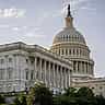 The dome and neoclassical facade of the United States Capitol building in Washington, D.C.